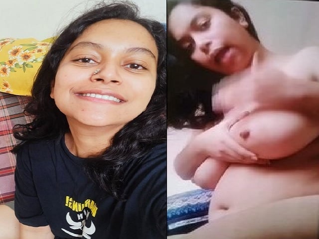 Smiling girl nude playing with big boobs and pussy
