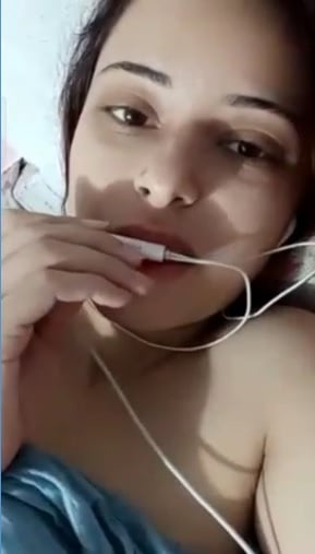 Cute skinny girl showing her small tits on VC