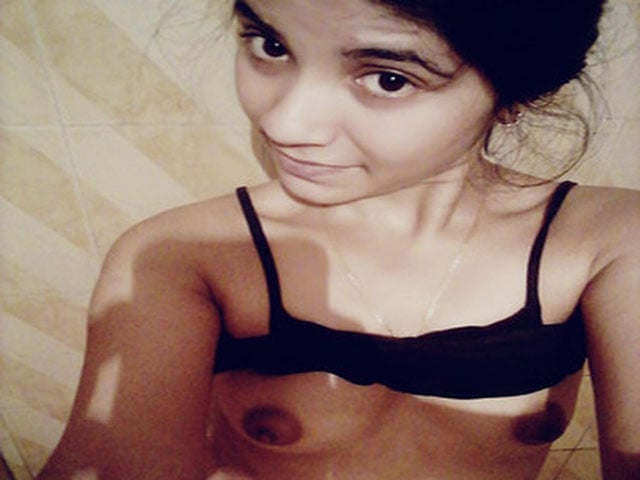 Cute girl making video of her naked boobs