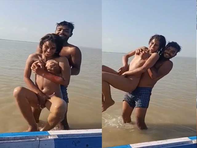 Enjoying with busty Desi slut in river